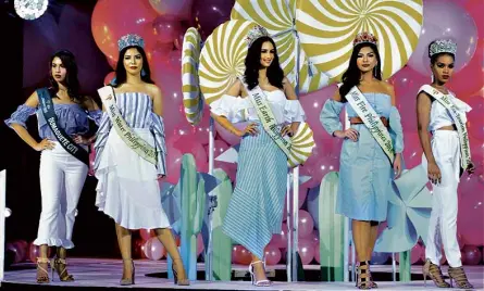  ??  ?? Ms. Earth Philippine­s 2018 winners Nathalie Louise Roxas, Berjayneth Chee, Silvia Celeste Cortesi, Jean Nicole de Jesus, and Halimatu Yushaw