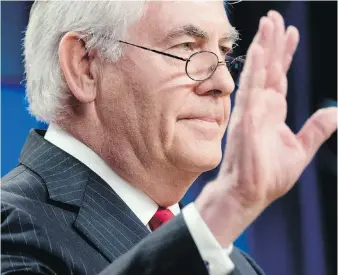  ??  ?? Rex Tillerson waves goodbye after speaking at the U.S. State Department on Tuesday.