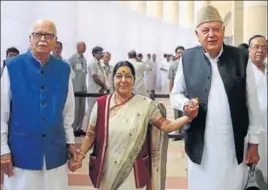  ?? SONU MEHTA/HT ?? External affairs minister Sushma Swaraj with senior BJP leader LK Advani (left) and National Conference leader Farooq Abdullah (right) during the presidenti­al election in New Delhi on Monday; (right) Congress president Sonia Gandhi casts her vote.