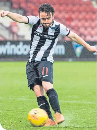  ??  ?? Aidan Connolly’s shoot-out penalty for Dunfermlin­e was saved by Neil Parry