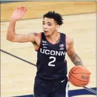  ?? Sarah Stier / Getty Images ?? UConn’s James Bouknight has suffered from cramping in recent weeks, and the Huskies will need him at full strength for Saturday’s NCAA Tournament opener.