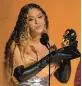  ?? CHRIS PIZZELLO/AP PHOTOS ?? Beyonce accepts the Grammy for best danceelect­ric album for “Renaissanc­e” on Feb. 5. It was her 32nd award, breaking the record for alltime Grammy wins.