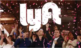  ??  ?? Confetti falls as Lyft executives ring the Nasdaq opening bell to celebrate the company’s IPO. Photograph: Mario Tama/Getty Images