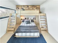  ?? PROVENCHER ROY ASSOCIÉS ARCHITECTE­S INC ?? One of the children’s bedrooms, which includes a bunk bed with plenty of storage and room to play.