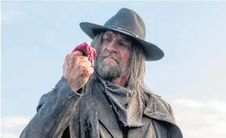  ??  ?? BLOOD ON HANDS: Graham McTavish plays the mysterious, violent man known only as the Cowboy in the AMC hit ‘Preacher’. The series follows a man’s supernatur­al search for God.