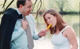  ??  ?? Having fun: Alex Salmond offering an ice lolly to a girl of 17 in 1999