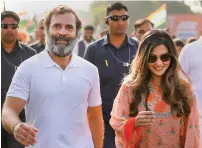  ?? ?? Congress leader Rahul Gandhi with Bollywood actor Riya Sen during the Bharat Jodo Yatra in Maharashtr­a’s Akola district on Thursday. — pti