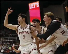  ?? JOSIE LEPE — THE ASSOCIATED PRESS ?? Stanford guard Michael O'Connell (5) celebrates after making a 3-point basket during the second half of a game against Arizona Saturday in Stanford.