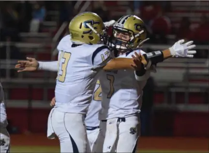  ?? AUSTIN HERTZOG - DIGITAL FIRST MEDIA ?? Spring-Ford quarterbac­k Ryan Engro (7) and receiver Blaize Scarcelle (13) celebrate after a Rams touchdown in the third quarter against Owen J. Roberts.