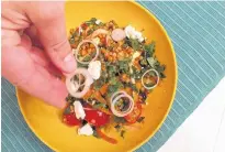  ?? CONTRIBUTE­D ?? Chef Ilona Daniel's Greek lentil salad is affordable and, because it can easily be made in advance, leaves plenty of time to spend with guests when grilling outside this summer.