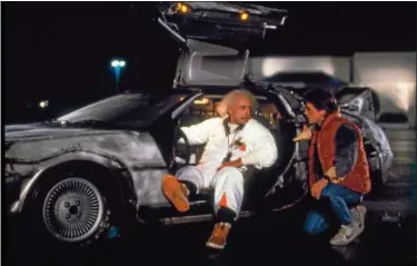  ?? PHOTO COURTESY UNIVERSAL PICTURES. ?? This scene from “Back to the Future” features Christophe­r Lloyd and Michael J. Fox.