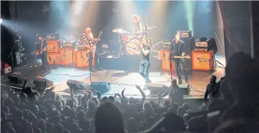  ??  ?? Eagles of Death Metal on stage at the Bataclan concert hall in Paris just minutes before the attack began.