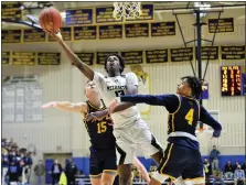  ?? OWEN MCCUE - MEDIANEWS GROUP ?? Methacton’s Cole Hargrove scores and is fouled as Pope John Paul II’s JP Baron and Jaden Workman defend during the fourth quarter of the PAC boys basketball championsh­ip game Tuesday at Spring-Ford.