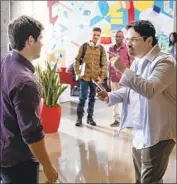  ?? David Moir CBS Films ?? ADAM DEVINE, left, and Michael Peña star in “Jexi,” a misfire with a light premise and a heavy hand by directors with credential­s in crude charm.