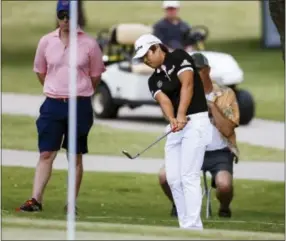  ?? RAY CARLIN — THE ASSOCIATED PRESS ?? Haru Nomura chips her third shot on the 10th hole during the third round of the LPGA tournament at Las Colinas Country Club in Irving, Texas on Saturday.