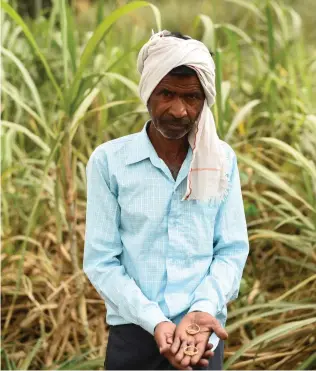  ??  ?? Roshan Lal of Kunwarpur Basit village in Hardoi district says he needs to mortgage his wife's gold earrings to pay bank loan because Ajbapur mill has not given him R2 lakh for the sugarcane he supplied two months ago