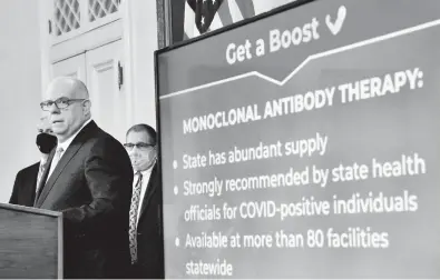  ?? AMY DAVIS/BALTIMORE SUN ?? Gov. Larry Hogan provides updates on the state’s COVID-19 rate, vaccinatio­ns, booster shots and treatment during a briefing at the State House on Thursday.