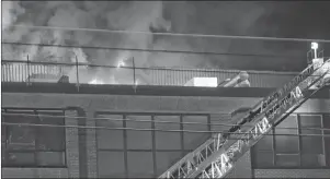  ?? TRURO DAILY NEWS PHOTO ?? Nine fire department­s responded to a fire that broke out on the roof of the Cox Institute of the Dalhousie Agricultur­e Faculty in Bible Hill on Wednesday night.