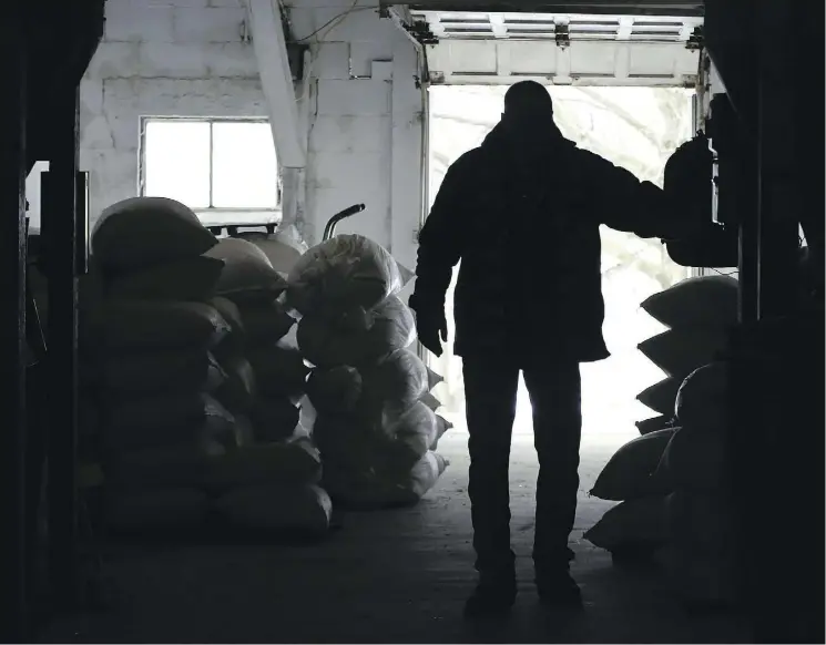  ?? KEITH SRAKOCIC/AP FILES ?? Stacks of livestock feed are sold at the Sankey’s Feed Mill store in Volant, Pa. Fruit growers, cattle ranchers and grain farmers bemoaned the U.S. tariffs on imported steel and aluminum in a hearing with the House of Representa­tives trade sub-committee Wednesday. They said the duties raised their costs while retaliatio­n was hurting overseas markets.