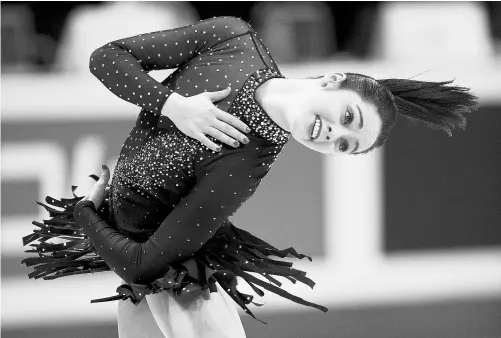  ?? PAUL CHIASSON/ THE CANADIAN PRESS ?? Sherwood Park’s Kaetlyn Osmond performs at the world figure skating championsh­ips in London, Ont., on March 14.