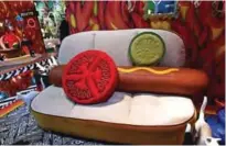  ??  ?? The sofa “Hot Dog” designed by Studio Job for Seletti is pictured during the 57th edition of the Salone del Mobile, Milan’s Internatio­nal Furnishing and design fair.