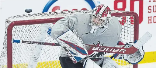  ?? NATHAN DENETTE THE CANADIAN PRESS ?? Netminder Olivier Rodrigue and the Canadians take on the U.S. in the world junior tournament opener on Boxing Day in the Czech Republic.