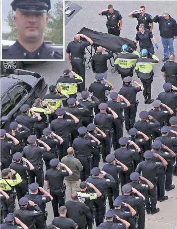  ?? STAFF PHOTO BY MATT STONE; COURTESY PHOTO, INSET ?? TRIBUTE TO COMRADE: Police officers salute as the body of Auburn cop Ronald Tarentino Jr. (seen inset) is taken to the medical examiner’s office yesterday.