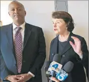  ??  ?? CAM GORE, VA assistant general counsel, with Sen. Dianne Feinstein, whose bill authorizes public-private partnershi­ps to develop housing and services.