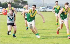  ??  ?? Hill End captain Liam Fitzpatric­k races to beat his opponent to the ball on Saturday.