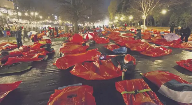  ??  ?? 0 £4m was raised when 8,000 people turned out in freezing temperatur­es for the event in Edinburgh’s Princes Street Gardens