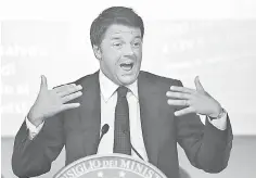  ??  ?? Renzi gestures during a news conference at Chigi palace in Rome. Renzi said on Tuesday that the country’s economic growth would be about “zero” this year, a sign the euro zone’s third-biggest economy is struggling to climb out of its third recession in...