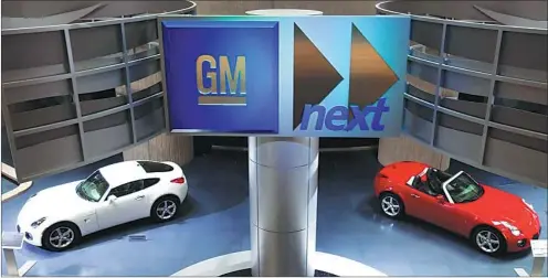  ?? MARK BLINCH / REUTERS ?? Cars on display at the General Motors Corp world headquarte­rs in Detroit. Among the automakers that have issued recalls in China in the first half of 2016, SAIC GM ranked first by recalling 2.2 million cars in three batches.