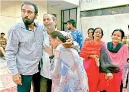  ?? — PTI ?? Relatives of victims of train accident mourn at Civil Hospital in Amritsar on Saturday.