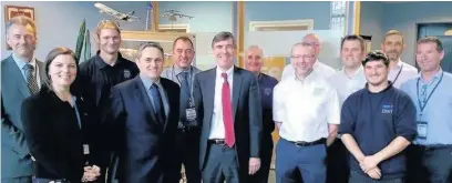  ??  ?? Macclesfie­ld MP David Rutley meets staff from Senior Aerospace BWT in Adlington