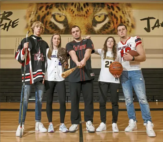  ?? Steve Mellon/Post-Gazette ?? Five siblings of the Fairman family are either playing or played sports at Thomas Jefferson High School. They will all play a different sport after high school. They are, from left, Hunter (hockey at Thomas Jefferson), Alysa (softball at Carlow), Eric (baseball at California, Pa.), Graci (basketball at Thomas Jefferson) and Garret (football at Robert Morris).