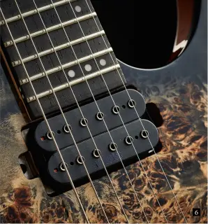  ??  ?? 6 You might assume that the C-6 Pro has a rosewood fingerboar­d. Well, you’d be wrong. Schecter has spec’d a slab of wenge for this guitar’s ’board. A richlookin­g timber, wenge is tough, which adds to the C-6 Pro’s snappy clean tone