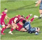  ??  ?? Flashpoint: Joe Marler (left) goes in to clear out TJ Ioane – with dire results