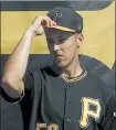  ?? JOHN MINCHILLO / AP FILE ?? New York traded for Pittsburgh’s Jameson Taillon in exchange for four prospects on Sunday.