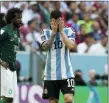  ?? AP PHOTO/EBRAHIM NOROOZI ?? Argentina’s Lionel Messi reacts during his team’s 2-1loss to Saudia Arabia on Tuesday at the Lusail Stadium in Lusail, Qatar.