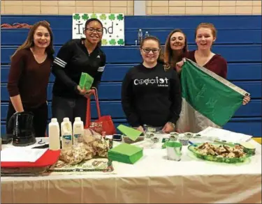  ??  ?? Jordyn Skidds, Ananiya Jones, Bridget Power, Jess Garrison and Emma Maguire at the Ireland table.