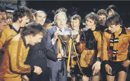  ??  ?? 0 Jim Mclean celebratin­g the 1979 League Cup win. Left, with fans after a stand was named after him at Tannadice in 2011.