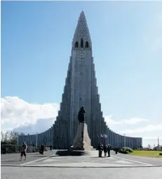  ??  ?? The Hallgrimsk­irkja, or the Lutheran Church of Iceland, was designed to evoke the sight of basalt lava flows.