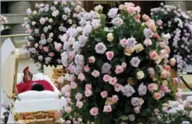  ?? PAUL SANCYA — THE ASSOCIATED PRESS ?? Aretha Franklin lies in her casket at Charles H. Wright Museum of African American History during a public visitation in Detroit, Tuesday.