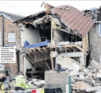  ?? ANDY CATCHPOOL ?? The rear of the house on Crescent Walk, Ravensthor­pe demolished by an explosion