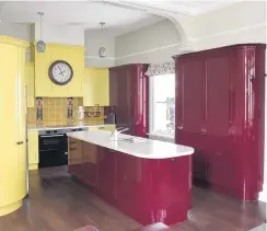  ??  ?? The kitchen’s colour scheme was inspired by reproducti­on Art Nouveau tiles chosen for the splashback.