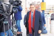  ?? ASSOCIATED PRESS ?? CNN reporter Jim Acosta walks into federal court in Washington on Wednesday. CNN is suing the White House over the revocation of Acosta’s press pass.