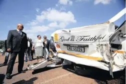  ?? PICTURE: BONGANI MBATHA ?? SETBACK: Minister in the Presidency Jeff Radebe, Minister of Transport Dipuo Peters and KZN MEC for Safety and Security Willies Mchunu inspect the wreckage of a taxi after a crash in Pinetown.