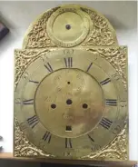  ??  ?? The Curry family Grove grandfathe­r clock with the original unrestored face above and the restored face left