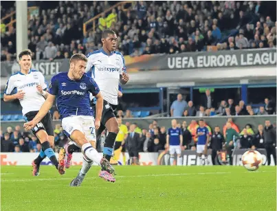  ?? Picture: PA. ?? Nikola Vlasic strokes the ball home to put Everton 2-1 ahead against Apollon Limassol.