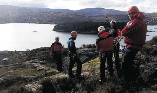  ??  ?? LIFESAVERS: The Torridon team have issued a plea for cash help to build their new centre after six mountain deaths in 2015